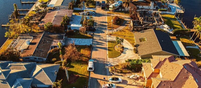 aerial view of damaged homes after hurricane ian