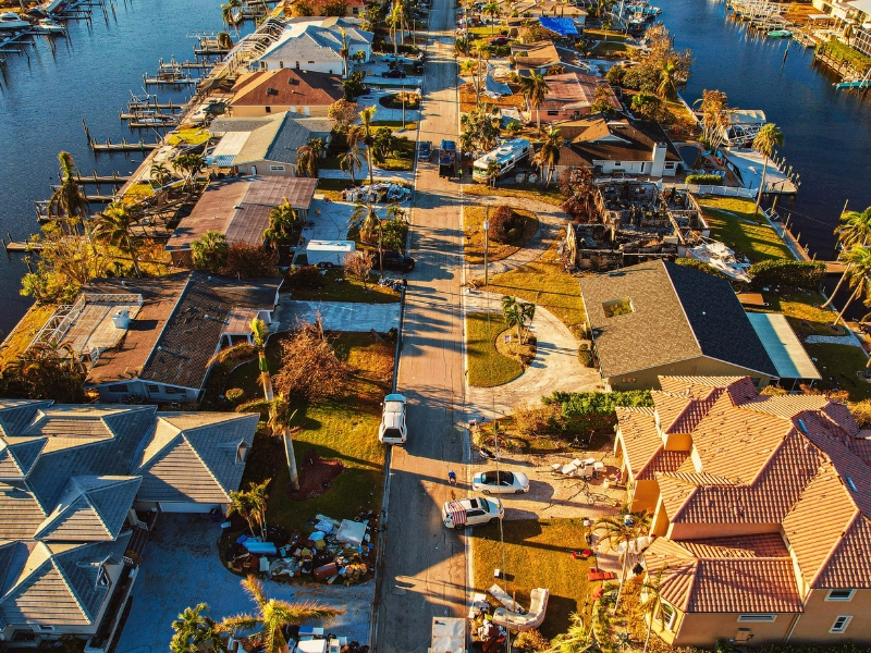 aerial view of damaged homes after hurricane ian