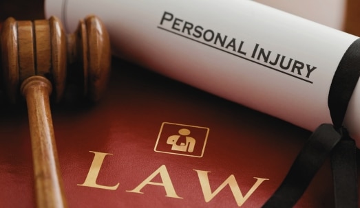 Red leather Personal Injury Law book. Concept of updates to the statute of limitations for personal injury claims in Florida