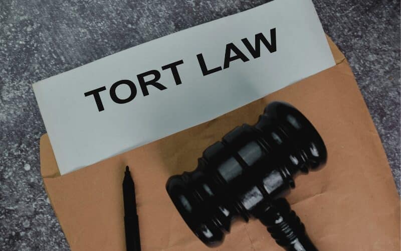 Tort Law text write on a paperwork and gavel isolated on office desk. Concept of How Will Florida Tort Reform Bill 837 Affect My Injury Case