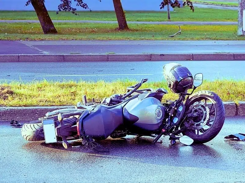 damaged motorbike on the city road at the scene of an accident. motorcycle accidents in florida