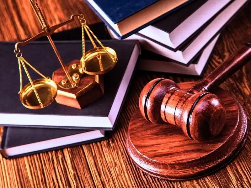 Balance scale on top of the books and gavel on the side. Suboxone lawsuits