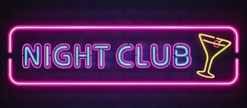 Night club, cocktail bar bright neon retro signboard. Dram Shop Laws