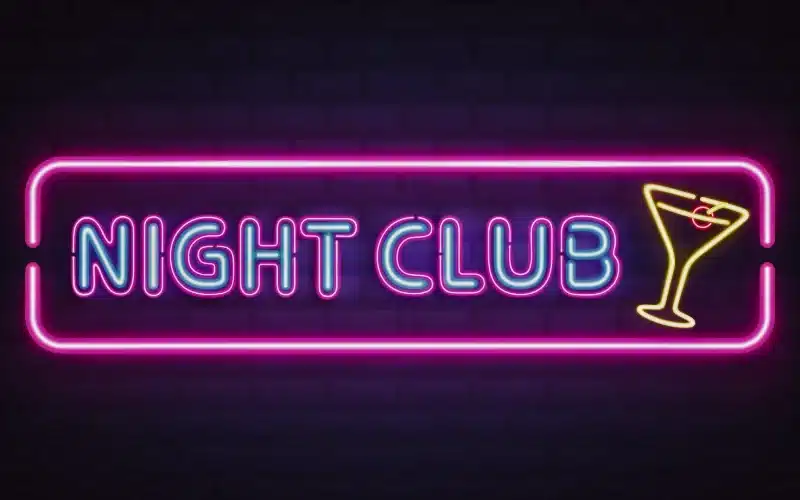 Night club, cocktail bar bright neon retro signboard. Dram Shop Laws